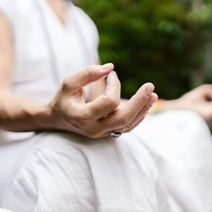 Detail of a hand in a mudra position