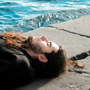 Woman breathing deeply in a meditative pose